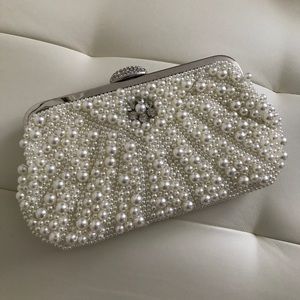 Brand new: Cream/Off-white pearl clutch w/ chains